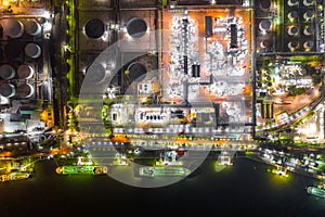 Oil tanker ship loading in port at oil refinery, Aerial view from above