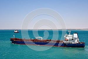 Oil tanker ship transiting Suez Canal.