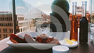 Oil, vinegar bottles and bread in a restaurant outdoors