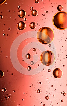 Oil and water abstract in metallic red