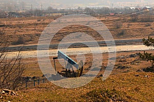 Oil well located on the banks of the Trotus River, Comanesti, Bacau County.