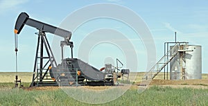 Oil well and tank