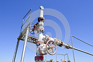 Oil well wellhead equipment. Hand valve with handwheel for opening and closing the flow line.