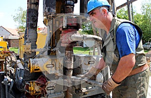 Oil Worker Drilling For Oil on Rig