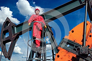 Oil Worker and Petroleum Industry Pump Jack