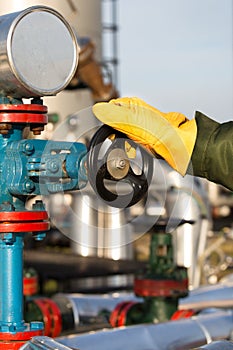 Oil worker turning valve