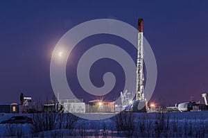 Oilfield in winter night time