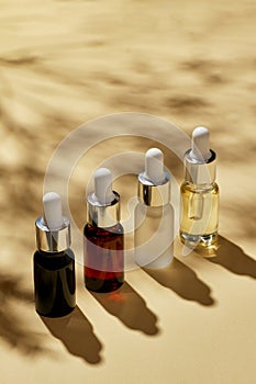 Oils for spa treatment in different glass bottles