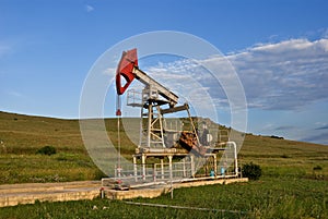 Oilwell in a fields photo