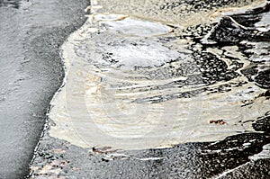 Oily river water