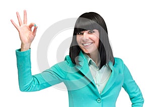 OK sign woman. Businesswoman showing okay hand sign. Successful and beautiful caucasian business woman isolated on white