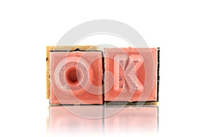 OK text on rubber stamp