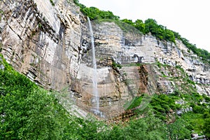 Okatse Kinchkha Waterfall, three-step waterfall cascade in the river gorge of Satsikvilo, Kutaisi, Gerogia