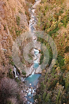 Okatse river and waterfall in Okatse canyon in winter, Georgia.