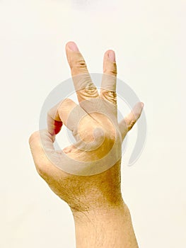 Okay hand sign white background