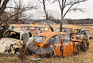 OKEMAH, OK - 2 MAR 2020: Volkswagon car junkyard located in a field