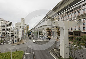 Yui Rail or Okinawa Urban Monorail running on track at twilight in Okinawa, Japan