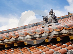 OKINAWA Lion on Ryukyu architecture Roof Art Okinawa island Japan