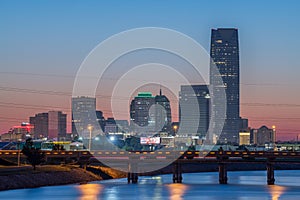 Oklahoma City, Oklahoma, USA downtown skyline on the Oklahoma River