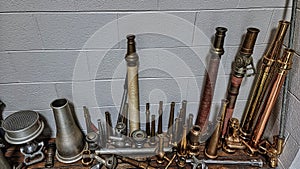 Oklahoma Firefighters museum collection of vintage fire nozzles.