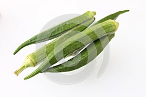 Okra fresh and green, isolated - ladies finger - Abelmoschus esculentus