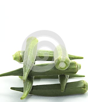 Okra is a healthy food that Japanese and Koreans and Europeans eat. and as herbs on white background isolated