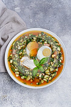 Okroshka soup on dark above