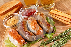 Oktoberfest traditional beer menu. Fried sausages with toast and mustard. photo