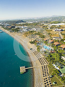 Okurcalar, Alanya region, Turkey. Drone view of the city resort with hotels, pools, and sandy beaches along the