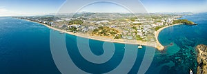 Okurcalar, Alanya, Turkey. Drone view of the wide blue transparent Mediterranean sea, reef under the water, a sandy