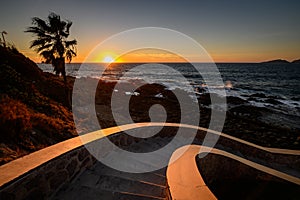 Sunset on Olas altas beach in Mazatlan, Mexico photo