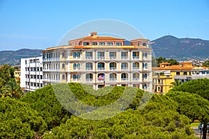 Olbia, Italy - Panoramic view of Olbia port area and Grand Hotel President with Cabu Abbas hills in background