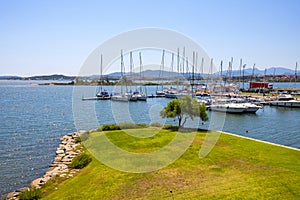 Olbia, Italy - Panoramic view of Olbia port and yacht marina area with piers and Tyrrhenian sea shore in historic old town quarter