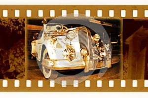 Old 35mm frame photo with retro car