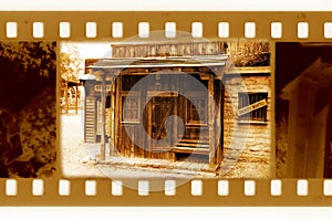 Old 35mm frame photo with vintage sheriff house