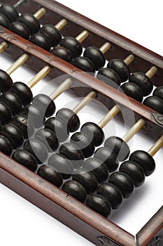 Old abacus ancient classic close up isolated on white background