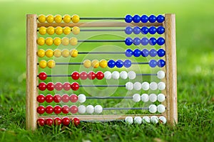 Old Abacus on gras. Learn to count