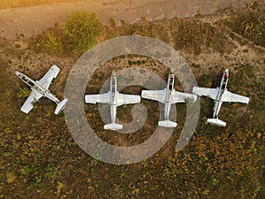 Old abandoned airfield with abandoned planes. Aerial view