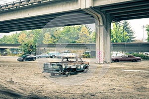 Old Abandoned Automobiles in a Parking Lot