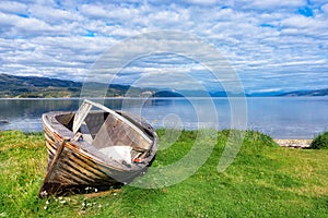 Old abandoned boat in the bay of Hjemmeluft, Norway