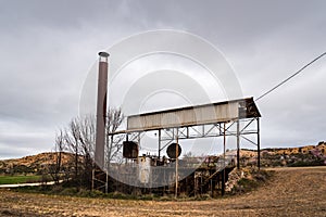 Old abandoned boiler used to distill lavender in The Alcarria Region of Spain photo