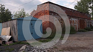 Old abandoned brick building in village. Clip. Abandoned and destroyed building in village. Old brick building in