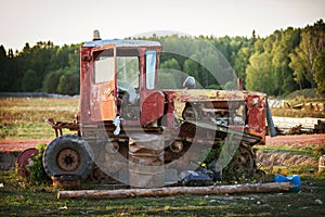 old abandoned broken tractor on a farm