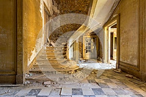 Old abandoned building with the decayed stairs