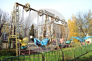 Old abandoned colorful attractions in the park