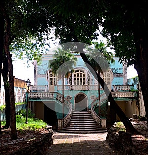 Old, abandoned, colorful colonial house in south america