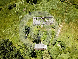 old abandoned country house in forest, aerial view