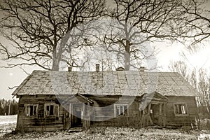 Old abandoned, almost decayed wooden house.