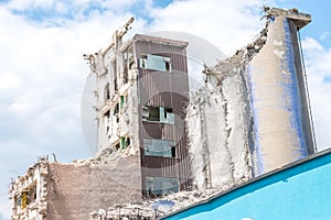 Old abandoned dirty comunism silo for sand and silicon and factory building during demolition