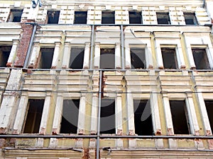 Old abandoned empty uninhabited house without wind